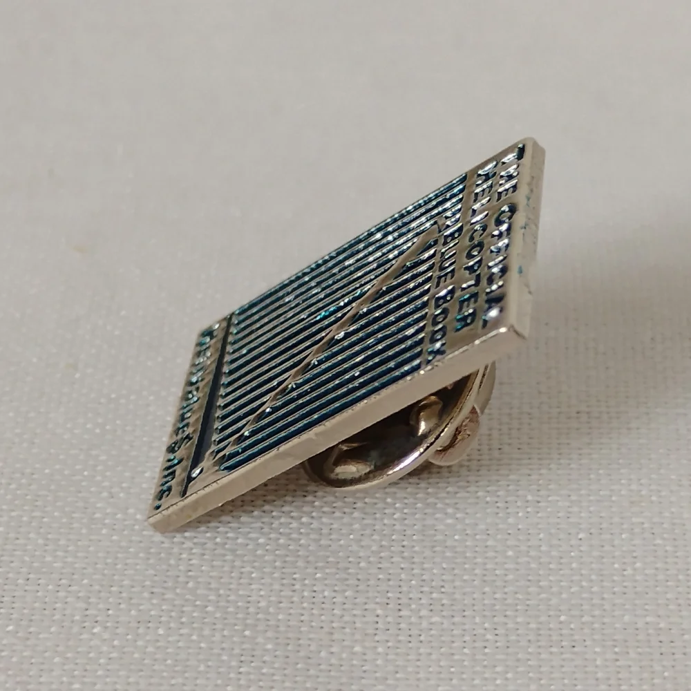 HeliValue$ Inc. The Official Helicopter Blue Book Enamel Lapel Pin Hat Bag Shirt